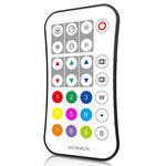 A remote control with a numeric keypad and colorful LED indicator lights, labeled as 'LED Remote'.