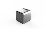 A silver cube-shaped sound speaker with a speaker grill on the front.