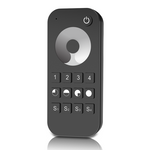 A black remote control with touch wheel and buttons labeled for 4 zones dimming.