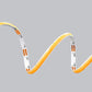 Yellow LED strip light on a gray background