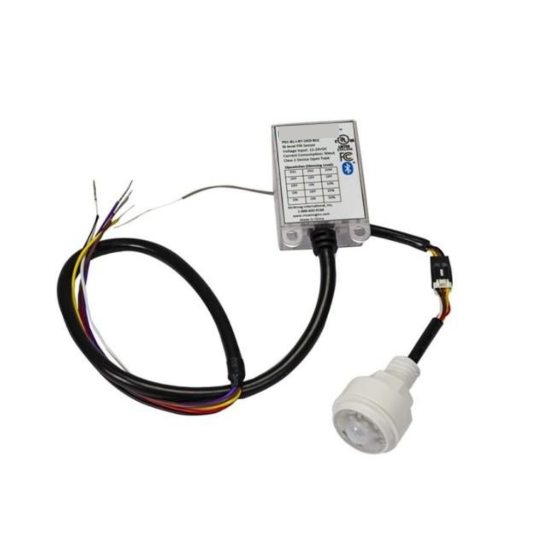 A passive infrared bi-level sensor with daylight harvesting capabilities, with wires and a white sensor head.