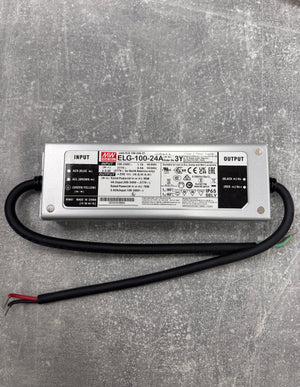 Power supply unit with label on a gray surface
