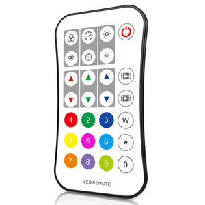 A remote control with a numeric keypad and colorful LED indicator lights, labeled as 'LED Remote'.