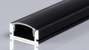 Black metal profile on a reflective surface with a gray background