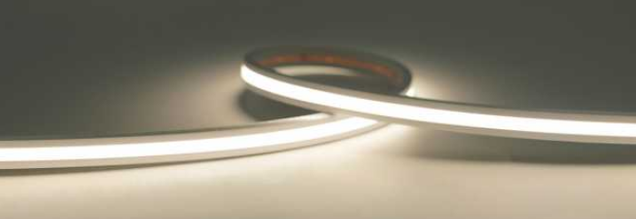 Close-up of a roll of LED strip light on a dark background