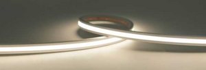 Close-up of a roll of LED strip light on a dark background