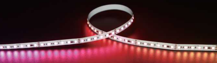 Roll of RGB LED strip light on a dark background