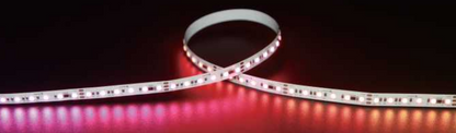Roll of RGB LED strip light on a dark background