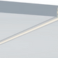 Close-up of a metallic frame with a light gray background