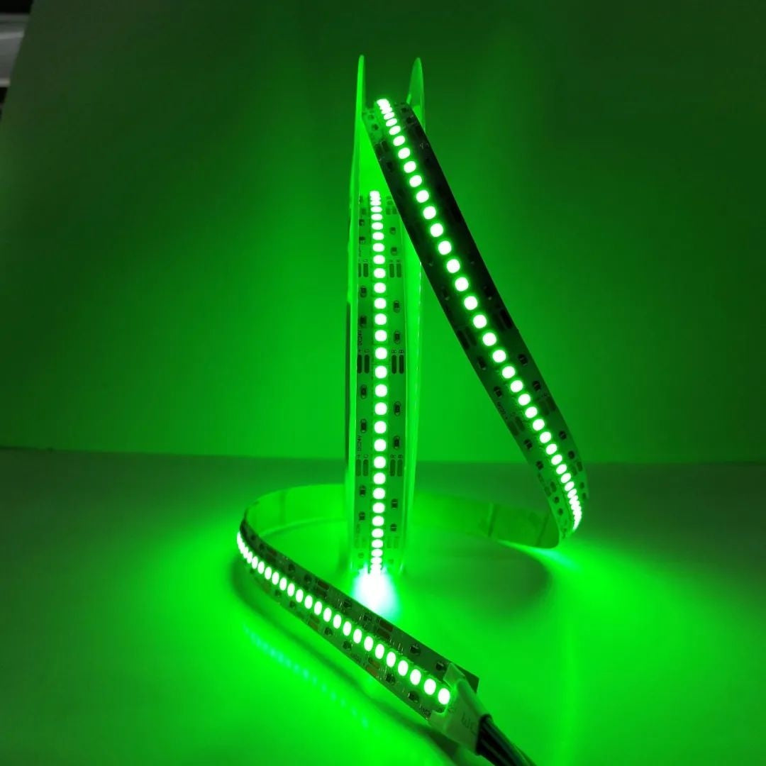 Green LED strip lights on a reflective surface with a green gradient background