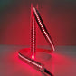Red LED strip light on a white surface with a red background