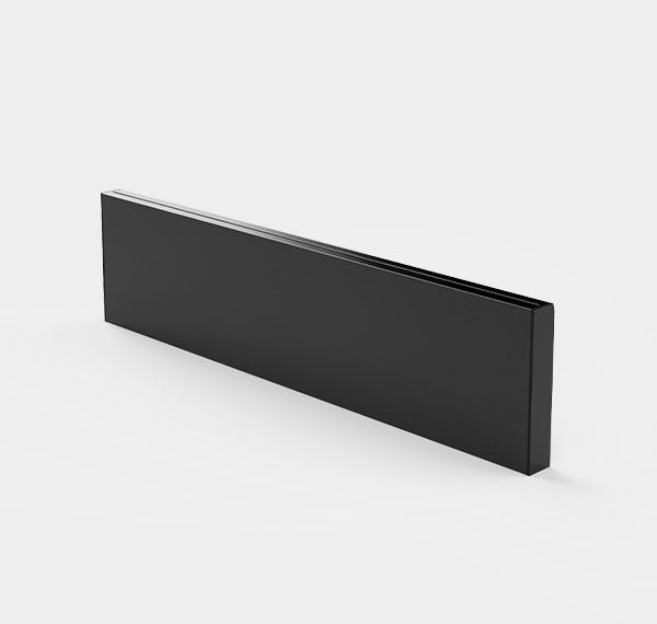 A black surface mount track for lighting fixtures, with a smooth and sleek finish.